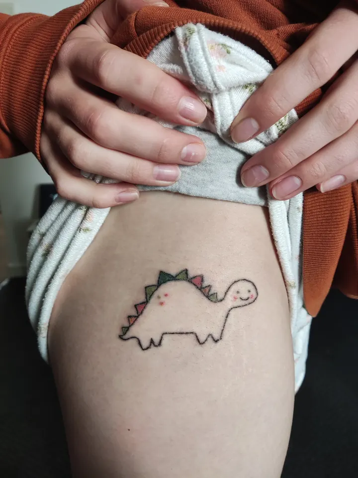 Cover-ups: finished tattoo, with the before photo inset
